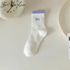 Calcetines blancos para mujer, calcetines de otoño e invierno hasta la pantorrilla, color liso, desodorantes, jacquard, deportivos, calcetines versátiles, calcetines de otoño sin costuras, moda ins