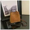 Bolsa de mão transfronteiriça de comércio exterior da moda para mulheres, nova bolsa de balde retrô de tecido escovado para o dia a dia, bolsa de ombro e transversal estilosa