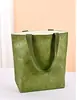 Bolsa de papel Dupont con logo personalizado, bolsa de lona vintage, bolsa de hombro de papel kraft lavable para compras, en stock
