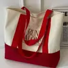 Bolso de lona transfronterizo para mujer, nuevo bolso de hombro grande, simple y elegante, bolso de mano versátil estilo coreano para el día a día