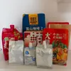 Bolsa de embalaje con boquilla de succión de sellado lateral de ocho lados bolsa autosoportante para comida de gato comida de perro bolsa transparente para líquido de medicina china bolsa de café personalización