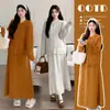 Nuevo conjunto de punto otoño/invierno para mujeres embarazadas: cárdigan de punto grueso + falda midi de cintura alta, diseñado para ocultar el vientre y crear un efecto adelgazante, perfecto para usar como capa exterior
