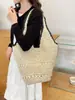 Bolsa de playa tejida casual de verano para mujer, bolsa de hombro versátil para el día a día estilo Hepburn de alta gama