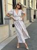 Vestido Floral Cruzado con Cuello en V Europeo y Americano 2025 Nuevo Verano Estampado Cintura Falda Larga Vestido de Manga Abullonada para Mujer