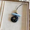 Collar ovalado de resina estilo étnico, lujo ligero con un toque de alta gama, cadena para suéter de moda vintage, collar de diseño nicho para mujer
