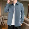 Camisa de marca de moda trendy estilo coreano para primavera y otoño, camisa casual negra elegante de manga larga para hombre 2026, top de primavera