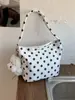 Bolsa de Nylon com Bolinhas de Nicho Super Popular para Mulheres 2025 Nova Versátil Bolsa de Ombro para Usar Fora e no Trabalho Pequena Bolsa Tote