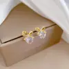 [Acero de titanio] Conjunto de collar y pendientes con microincrustaciones, elegante y ligero lazo de lujo, con personalidad, para banquetes.