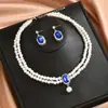 Collar de perlas de doble capa súper brillante con borla de diamantes completos, juego de pendientes para mujer, cadena de clavícula de lujo ligero de alta gama