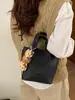 Bolso Cubo de Estilo Coreano de Nicho para Mujer Modelo Nuevo Primavera 2026 Bolso de Hombro Cruzado Elegante de Gama Alta