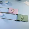 2022 nueva hebilla de amor cartera cruzada diagonal bolsa para teléfono móvil paquete de tarjetas de autobús INS Red social bolsa para carcasa de teléfono