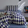 Conjunto de cama minimalista estilo Nantong de quatro peças, adequado para todas as estações, feito de algodão com estampa reativa
