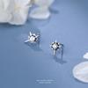 Pendientes de botón de plata pura s999 estrella de ocho puntas moda femenina lujo ligero pendientes de estrella nicho blanco y negro circón incrustado perforación de oreja
