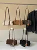 Bolso tipo almohada retro transfronterizo para mujer, nueva colección otoño 2026, moderno y versátil, adecuado para ir al trabajo, se puede llevar en la mano, al hombro o debajo del brazo