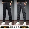 Pantalones casuales nuevos para primavera y otoño 2024, overol para hombre, bordado chino de calidad, cintura elástica, pantalones largos para hombre
