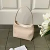 Bolso tejido de nicho estilo coreano, nuevo bolso de mano vintage para otoño e invierno, bolso de axila de lujo ligero versátil para el día a día