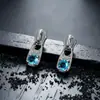 Pendientes de Racimo Completamente Diamantados de Nuevo Estilo Transfronterizos para Hombres, Modernos y Versátiles, Pendientes de Flor de Iris de Alta Gama en Forma de Cruz para Mujeres