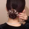 Xuxinhas, Faixas de Cabelo e Headbands da Moda com um Estilo Levemente Luxuoso e Elegante