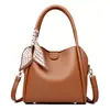 Bolsa de Mão de Luxo para Mulheres 2026 Nova Bolsa de Balde de Nicho Versátil para Trabalho e Deslocamento Bolsa de Ombro Único Transversal Bolsa Feminina Tendência