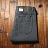 Pantalones casuales de negocios rectos holgados de sarga gruesa cepillada de cinco bolsillos de cintura media microelásticos para hombre de otoño e invierno 2022