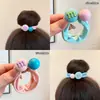 Coloridos coleteros de nuevo estilo 2026, versátiles y dulces, con accesorios de M&M's, anillos de toalla, diseños de dibujos animados y un estilo fresco y lindo, perfectos para accesorios para el cabello de niños