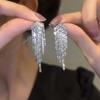 Pendientes largos con borlas y gotas de agua de circonita de la industria pesada, ligeros y lujosos, de plata S925, de alta gama y de moda para mujer.