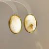 Aretes ovalados de acrílico con degradado estilo Melard para mujer, aretes de lujo ligero de alta gama, aretes de diseño de nicho para mujer