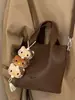 Bolsos Retro de Nicho para Mujer 2026 Nueva Moda Bolso de Mano de Alto Valor para el Trabajo Bolso Cruzado tipo Cubo