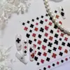 Adesivos de Unha Trevo de Quatro Folhas Minimalistas e Sofisticados, Item Quente de Celebridade da Internet, Adesivos de Unha Metálicos Vermelho e Preto Perolados de Luxo de Alta Qualidade