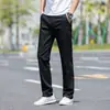 Calças Casuais Masculinas 2026 Novo Estilo Quatro Estações Business Retas Largas Cor Sólida Calças Longas Outono Calças Esportivas Masculinas