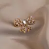 Broche de lazo para luz anti-carrera alta gama luz de lujo alta gama para mujer perla hebilla anti-carrera pasador de solapa al por mayor accesorios de corsage