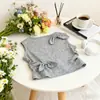Conjunto Doce de Verão para Bebê Coreano 2026 Novo Estilo Conjunto de Top Colete com Laço e Saia Floral Xadrez para Meninas