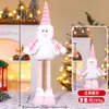 Nova Boneca de Natal em Pé Retrátil Velho de Listras Natalinas Boneco de Neve Boneca de Pernas Longas Decoração de Janela de Hotel