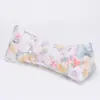 Una fábrica de origen para almohadas cervicales de cáscara de trigo sarraceno, almohadas triangulares para protección del cuello, almohadas florales, almohadas de protección para el cuello en forma de diamante, fabricación personalizada
