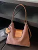 Bolsa Tote para Trajeto Transfronteiriço para Mulheres 2026 Nova Mochila de Grande Capacidade Versátil Casual Nicho Bolsa de Ombro Bolsa Transversal