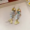 Brincos Longos com Gancho em Formato de Concha com Franja de Peixe Estilo Resort de Verão Luxo Leve Brincos de Alta Qualidade Atacado