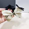 Diadema con lazo negro elegante de alta gama, estilo francés, nueva y elegante, estilo Chanel, cuerda para el cabello, anillo para el intestino grueso para mujer, accesorios para el cabello