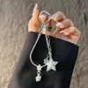 Moda estilo coreano estilo ins cadena de hueso de serpiente estrella correa para teléfono llavero colgante para bolso de cámara CCD para niñas