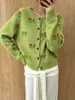 Cárdigan de punto jacquard estilo pastoral transfronterizo 2026 otoño e invierno cuello redondo estilo casual cárdigan de punto grueso para mujer
