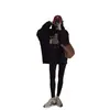 Sudadera de dibujos animados negra, prenda exterior para mujer, otoño/invierno 2026, una pieza popular y elegante este año, con un diseño relajado y moderno, y una sudadera con capucha