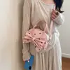 Bolsa de mão versátil estilo coreano com laço de bolinhas para mulheres, nova bolsa versátil da moda de nicho para ombro e transversal 2026