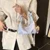 Bolsa de Mão com Corrente para Mulheres Nova Moda Primavera/Verão 2026 Versátil Bolsa de Ombro com Acabamento de Luxo para Uso Diário Bolsa Transversal para Mulheres