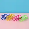Fábrica en stock bola de juguete para gatos que golpea cruzada suministros para mascotas color gato plástico resorte juguete para gatos