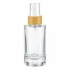 Stock Listo del Fabricante 50ml100ml Botella Cilíndrica de Fondo Grueso Botella para Sub-Embotellado de Cosméticos Esencia de Rocío Puro Hidratante