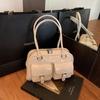 Bolso de bolos de gran capacidad estilo coreano, bolso de mano con múltiples bolsillos para la axila, bolso de hombro para uso diario, primavera y verano 2025.