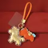 Fique Rico Logo Cavalinho Pingente de Couro Colorido Chaveiro Corrente de Celular Cavalo Desenho Evento de Ano Novo Pequeno Presente Atacado