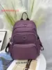 Chi Bao 2025 Nova Mochila Multicor em Tecido Oxford Moda Simples Bolsa Feminina Grande Capacidade Mochila de Montanhismo 3078-PS