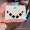 Brincos Clássicos de Trevo de Quatro Folhas para E-commerce Transfronteiriço Super Brilhantes Cheios de Diamante Moda Temperamento Celebridade da Internet Versáteis Brincos Femininos Atacado