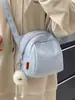 Bolsa de Peito Leve em Nylon 2026 Estilo Novo Tendência Bolsa Concha Versátil em Lona Casual para Ombro Transversal para Mulheres