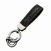 Colgante de Llavero de Cuero Gamuzado de Gama Alta para Coche Llavero con Logo de Coche Decoración de Llavero Colgante de Cintura de Metal Venta al por Mayor